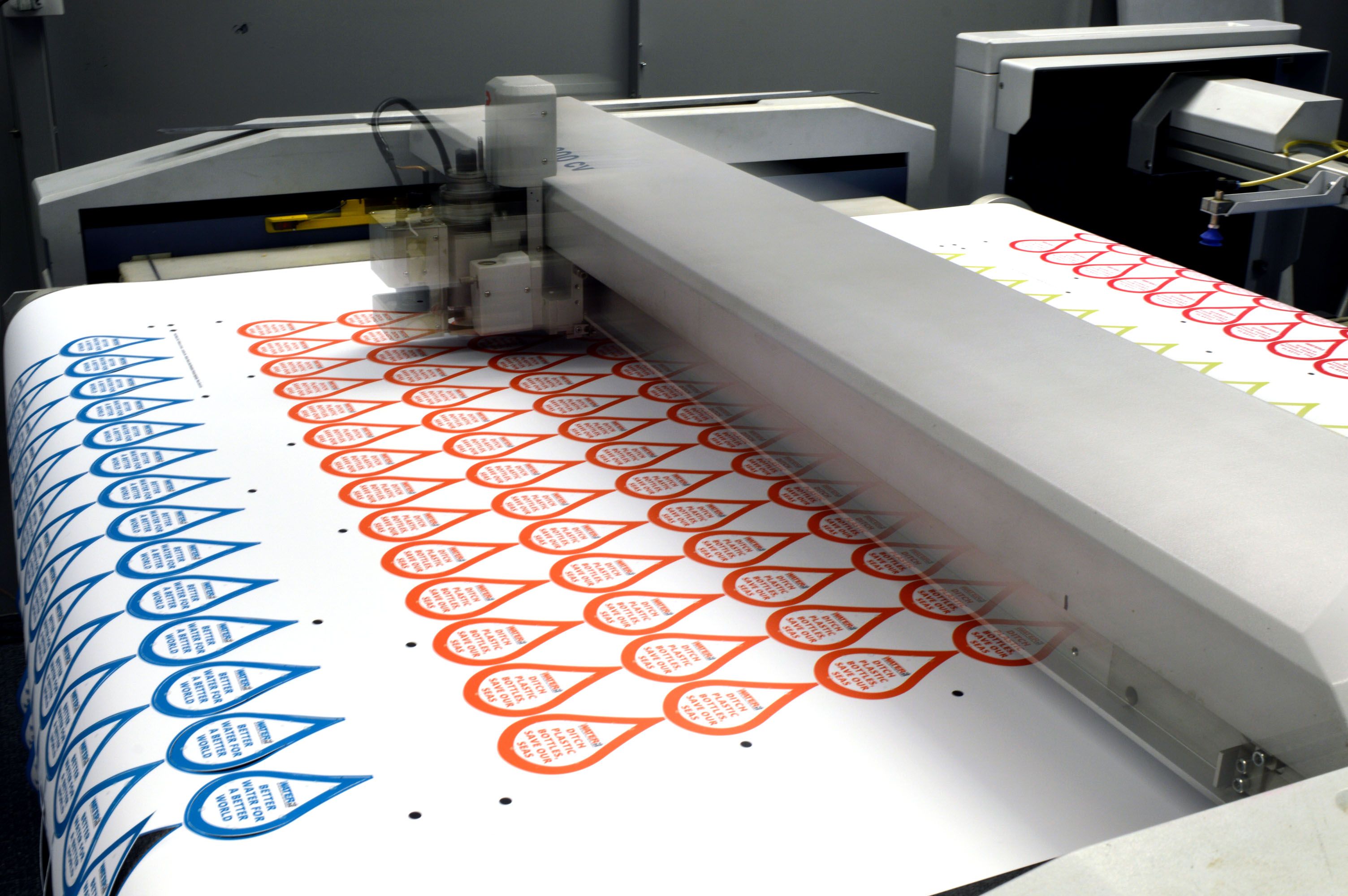 Custom_stickers_being_printed_on_a_flatbed_cutter.jpg